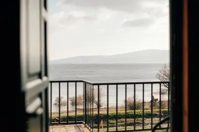 a view of the ocean from a window at Lake House Beliz in Livno