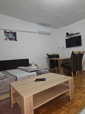 a living room with a coffee table and a couch at Meri in Jajce